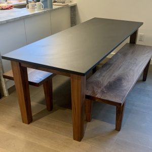 Custom Black Walnut table with benches and custom Churchill Soapstone table top 