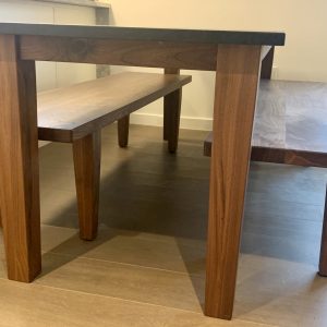 Custom Black Walnut table with benches and custom Churchill Soapstone table top 