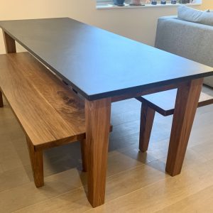 Custom Black Walnut table with benches and custom Churchill Soapstone table top 