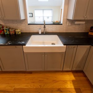 Norie Slate/Soapstone kitchen countertop with runnels and pass thru shelves 