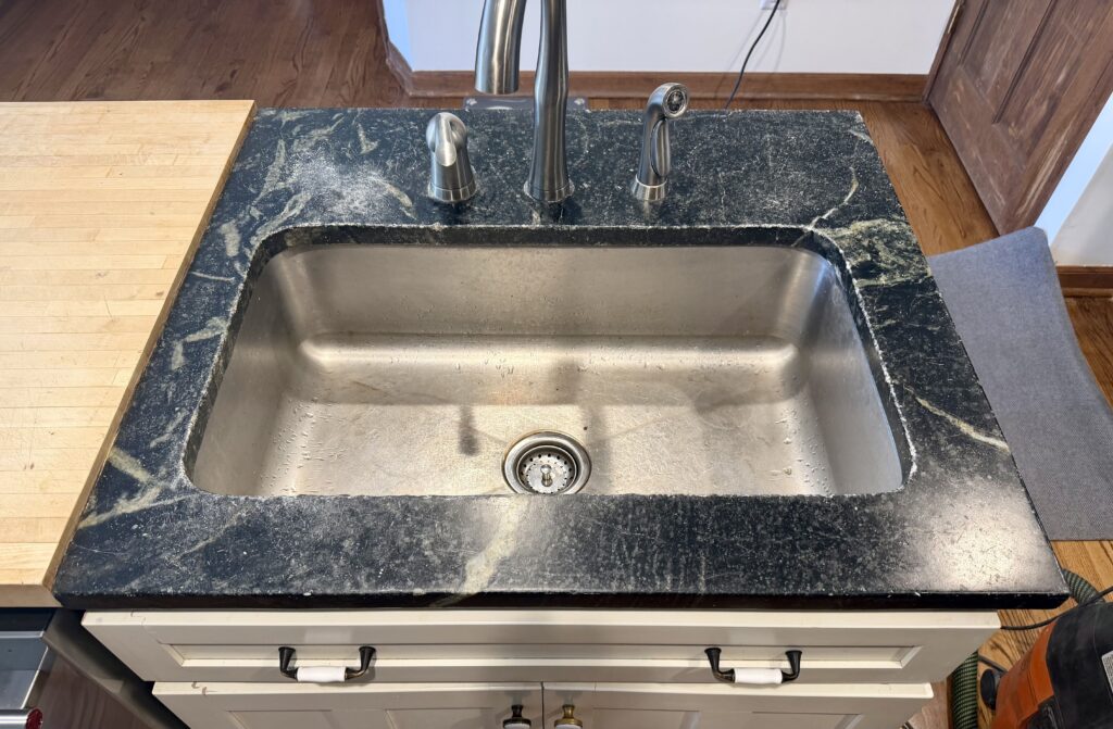 Existing soapstone countertop before sanding in Westfield