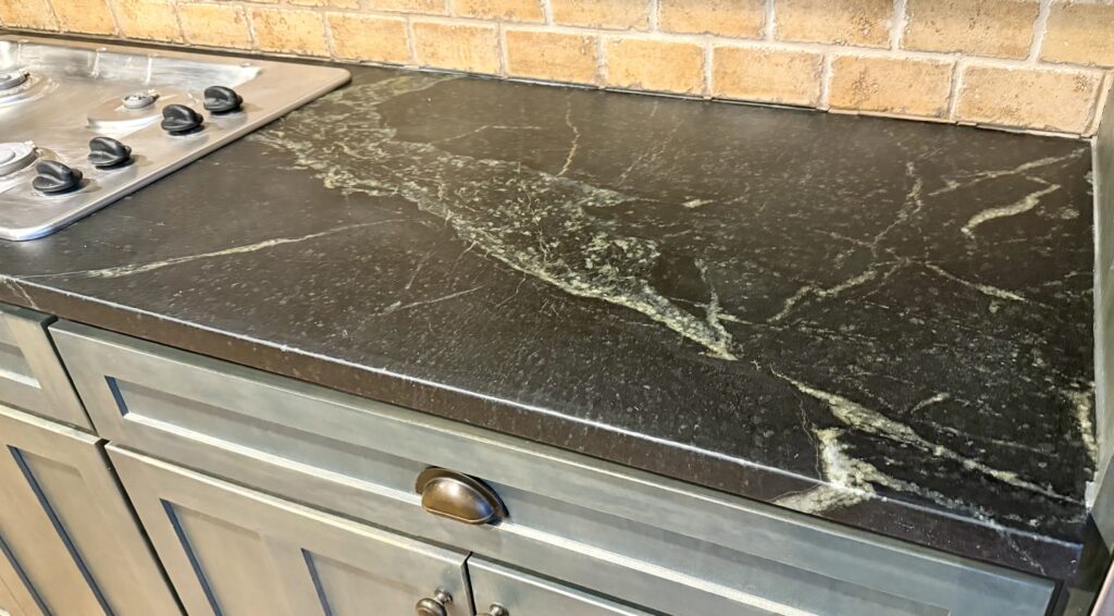 Soapstone slab after refinishing and waxing in Westfield