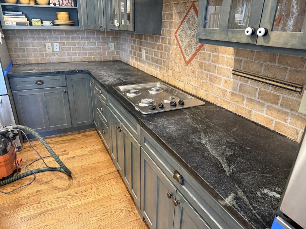 Untreated soapstone surface before sanding in Westfield home